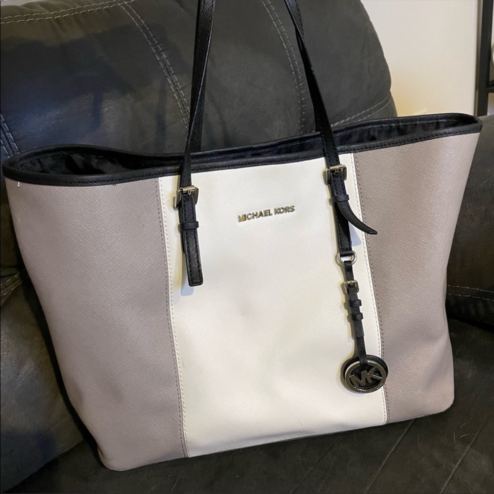 Michael Kors bag. Bottom corners frayed